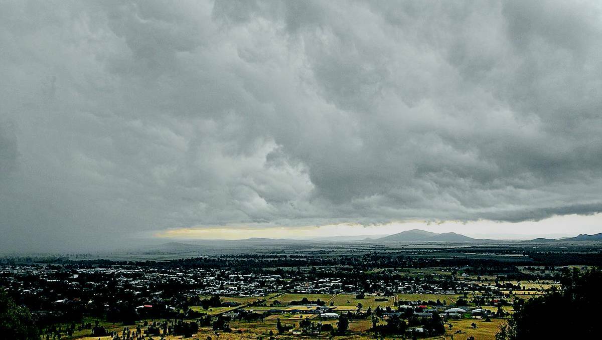 Black storm clouds roll towards Gunnedah. From Porcupine Lookout, the storm came from the west, bringing heavy rain and damaging winds. Photo:The Namoi Valley Independent.