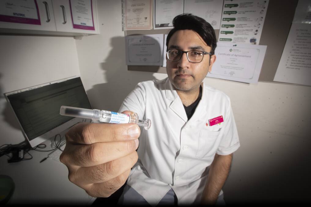 GET VACCINATED: Priceline pharmacist Omar Awan said the flu vaccine is just as important as the COVID-19 vaccine. Photo: Peter Hardin 