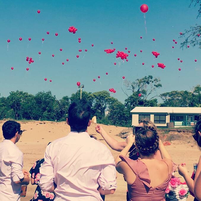 Releasing pink balloons to farewell tiny Skylar. 