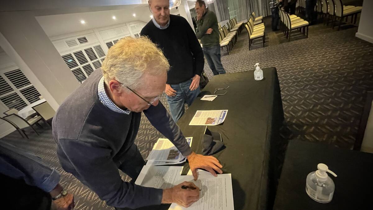 Signing the Guyra-Armidale council split petition. Picture by Rachel Gray