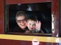 Brenda Crowell takes her grandson Rex Craig for a ride on a 121-year-old steam train. Picture by Gareth Gardner
