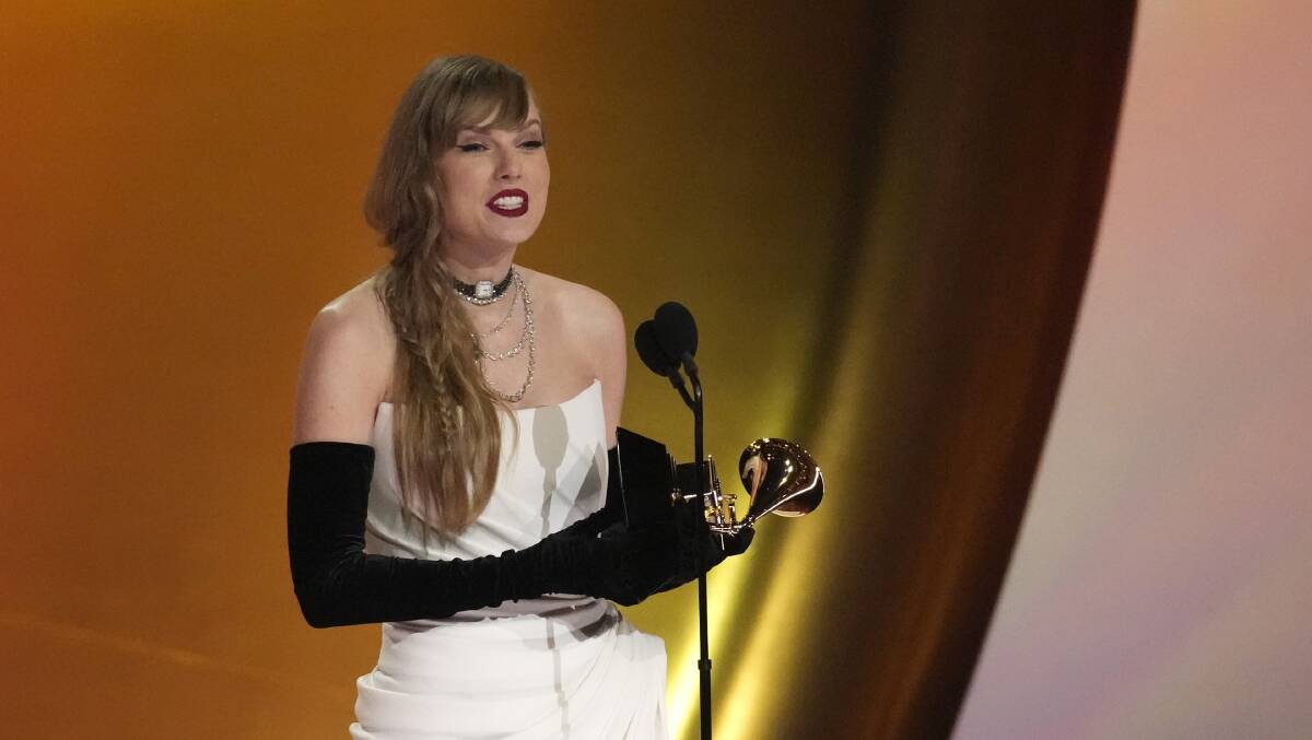 Taylor Swift accepts the award for best pop vocal album for "Midnights" during the 66th annual Grammy Awards. Picture by AP Photo/Chris Pizzello