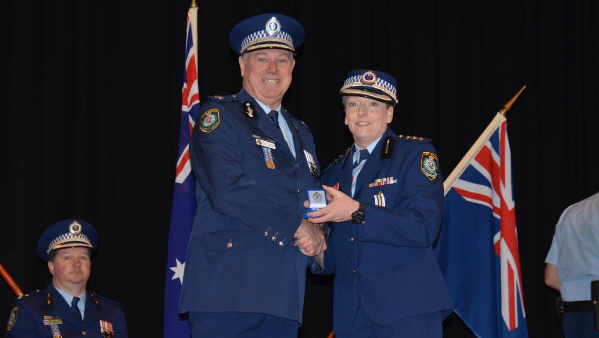 CEREMONY: Inspector Cheryl Day received a national police service medal, NSW police medal (2nd clasp) for 20 years service and North West metropolitan region commendation.