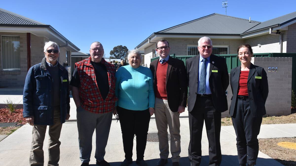 HOUSING: Northern Tablelands MP Adam Marshall with residents and Homes North representatives at the opening on Monday.