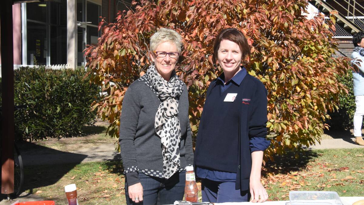 AWARENESS: Armidale Hospital palliative nurses Kim Taylor and Angelian Plumbe at the annual barbecue lunch to raise awareness about palliative care.