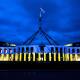 Ukrainian colours on Parliament House, Canberra, on Monday night. Picture: Sitthixay Ditthavong