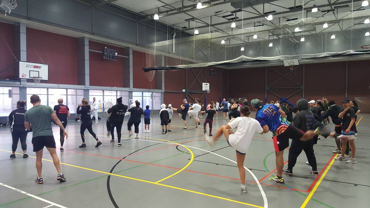 In the ring: Up to 100 kids and mentors attend the boxing sessions three times a week in Redfern in Sydney for the program that engages troubled teens, and Armidale police are hoping to draw a crowd too. Photo: Supplied