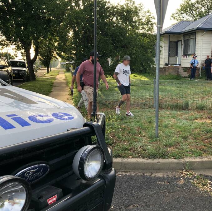 Under arrest: Police raided homes in Armidale and Uralla on Thursday morning and arrested five people. Photo: NSW Police