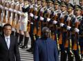 Chinese Premier Li Keqiang, left, and Solomon Islands Prime Minister Manasseh Sogavare review an honor guard in 2019. Picture: AAP