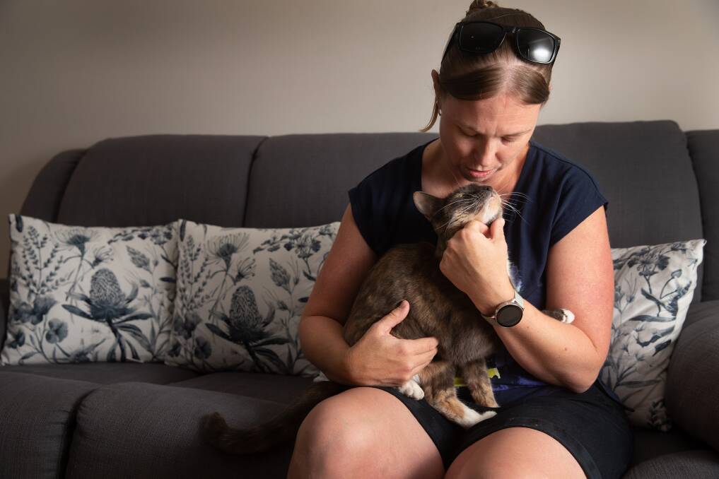 Luna the cat reunited with her Tamworth-owner Krystan Smith. Picture: Marina Neil
