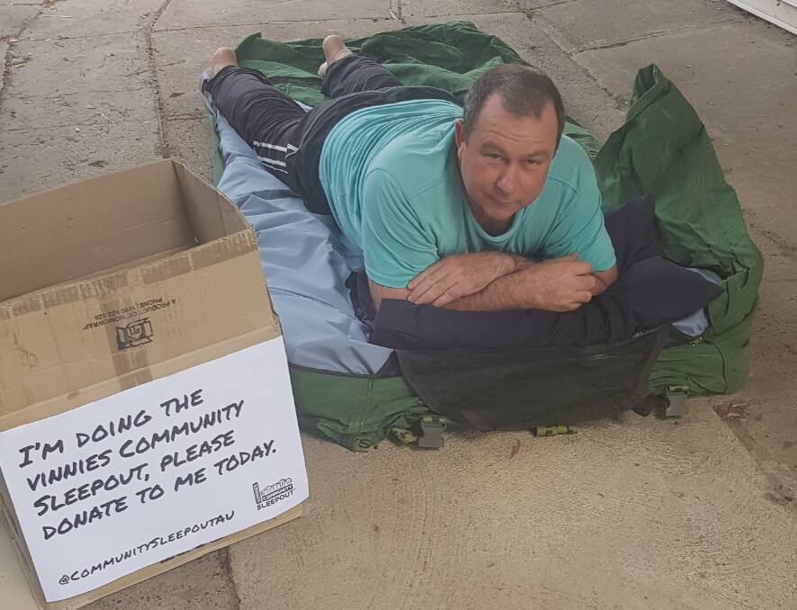 ROUGHING IT: Phil Donnan -St Vincent de Paul regional director for North West NSW getting ready for Friday's virtual sleep out. Photo supplied.