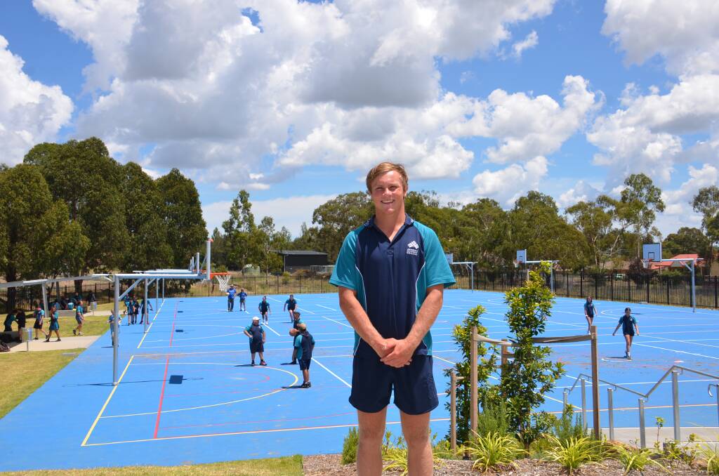 IN HIS ELEMENT: Secondary College sports captain Lochie McLeod in front of the new and adaptable basketball courts. Photo Vanessa Arundale.