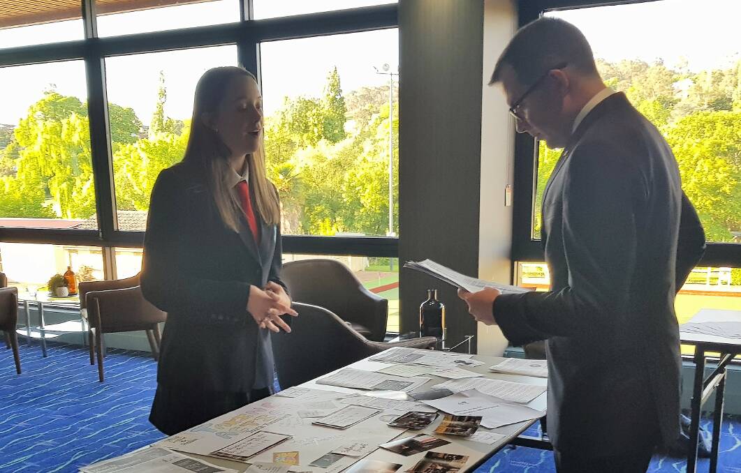 Gemma discusses her project with MP Adam Marshall at the Northern Tablelands Showcase event in Armidale. 