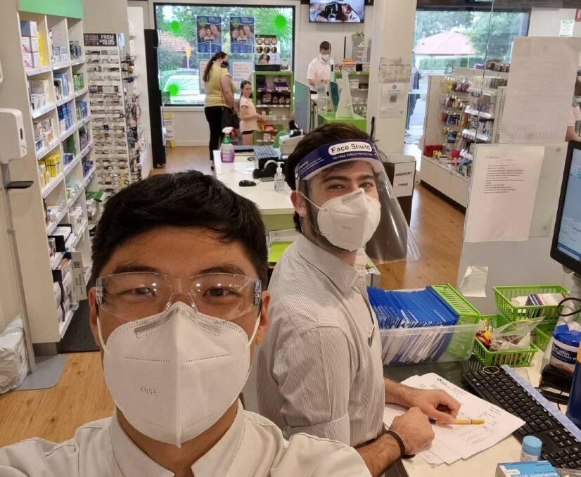 EXHAUSTED: Josh Lee and Thiart Kruger (TK) in Mountview Pharmacy on Tuesday. Picture: supplied.