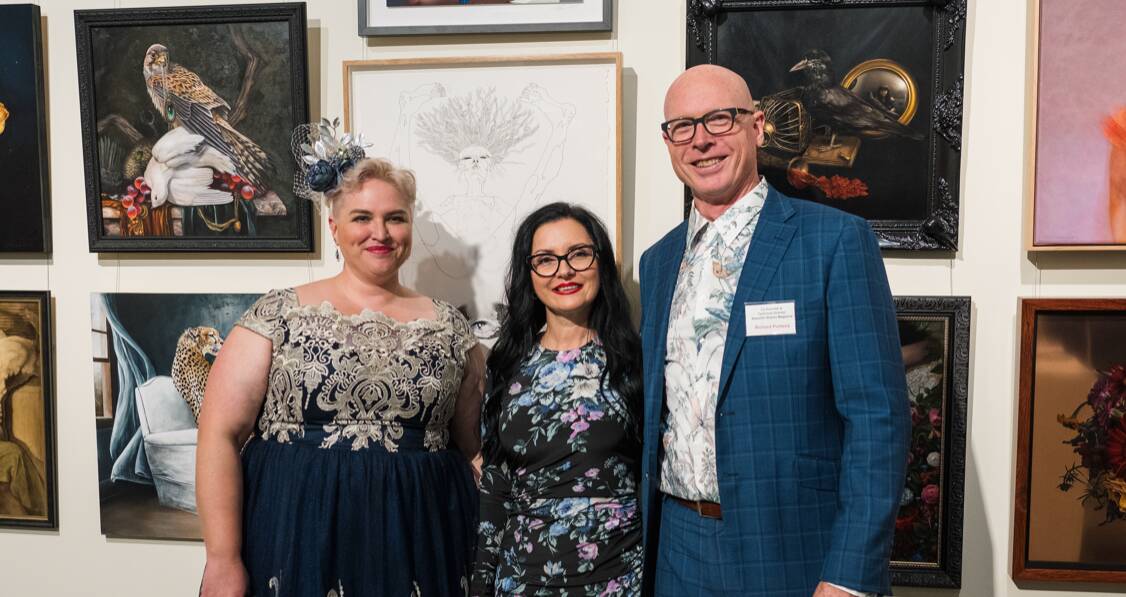 BRIGHT, BEAUTIFUL AND BIZARRE: Danijela Krha Purssey with her husband Richard and NERAM director Rachael Parsons at the opening of her current exhibition - Interconnected . Picture: supplied.
