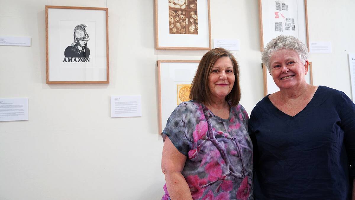 Jennifer Miller (left) and Diana Perry (right) from the Black Gully Printmakers are two of the artists who helped create the Past, Present and Print exhibition in the Armidale Regional Council foyer.