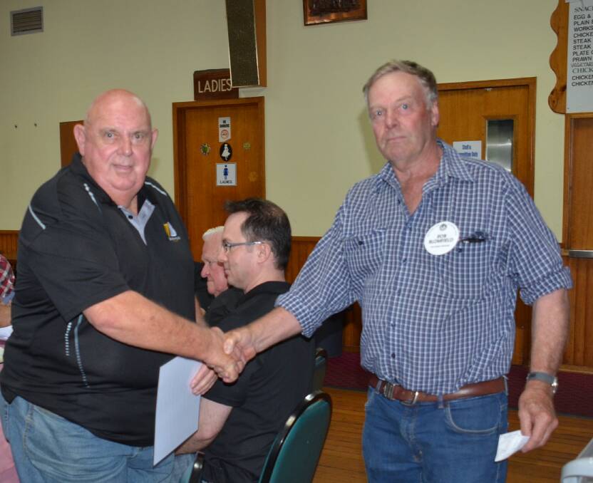WORDS ARE NOT ENOUGH: Seven Hills-Toongabbie RSL president Barry Wilson accepts a certificate of appreciation from Walcha Rotarian and grazier Rob Blomfield on Tuesday night following the donation of $100,000 to two Northern Tableland communities