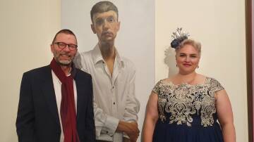 PORTRAIT POWER: Wayne Tunnicliffe from the Art Gallery of NSW with  Rachael Parsons director of New England Regional Art Museum. Picture:  Sarah Reddington