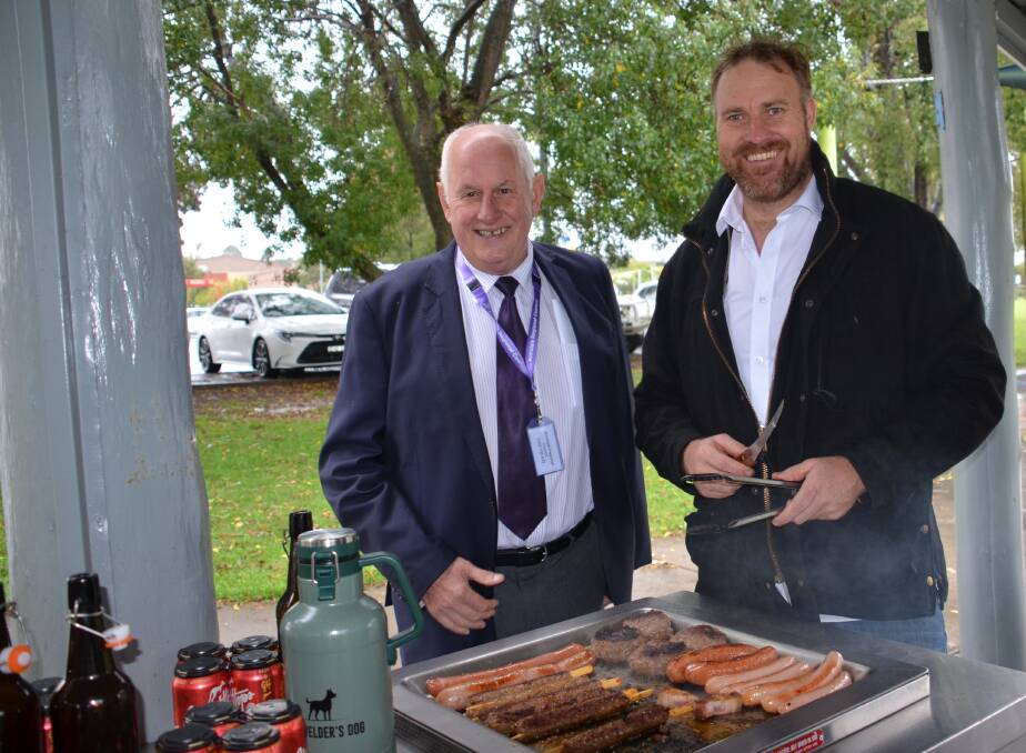 BOYS ON THE BARBIE: Armidale Mayor Ian Tiley with Scott Fittler from The Meating Place. Photo Vanessa Arundale.