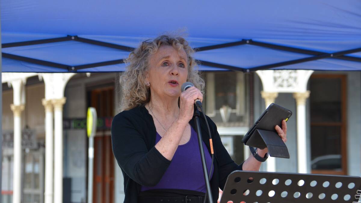 FURIOUS: Debra O'Brien addresses the crowd at the March4 Justice rally in Armidale Mall on Monday. Photo Vanessa Arundale