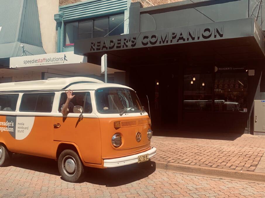 ON THE ROAD: Roy Wheatley (in the Reader's Companion Kombi parked outside his new shop) is offering free delivery to Armidale, Guyra , Uralla and Walcha book buyers.