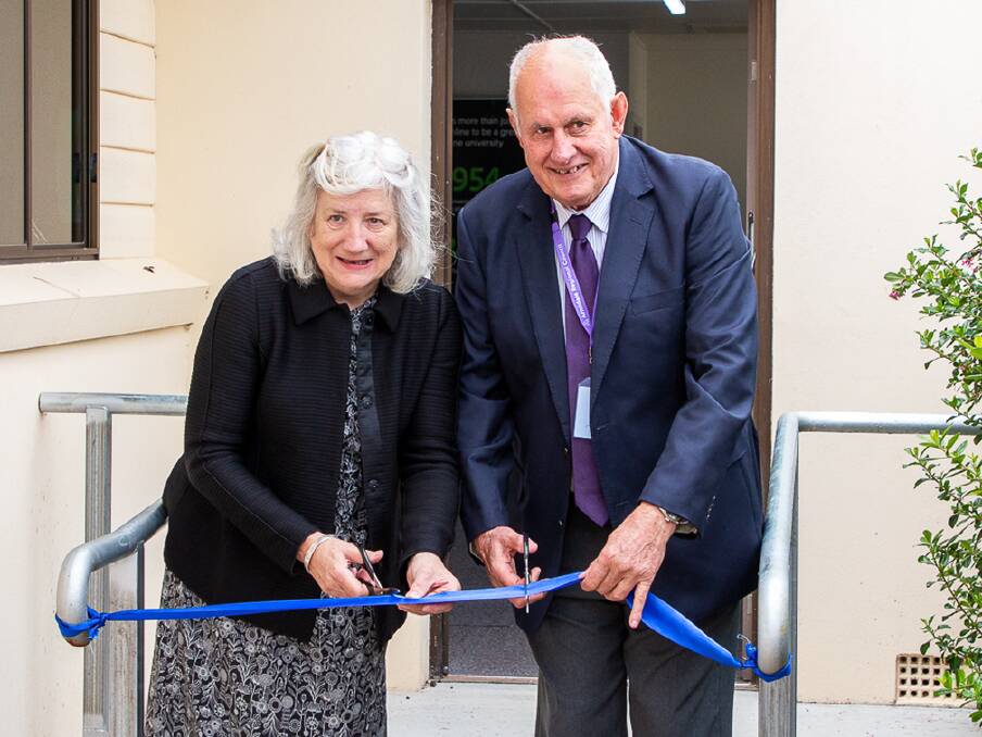 COME ON IN: University of New England vice-chancellor Professor Brigid Heywood and Armidale Regional Council mayor Ian Tiley cut the ribbon to open the UNE hub at Guyra. Photo supplied.