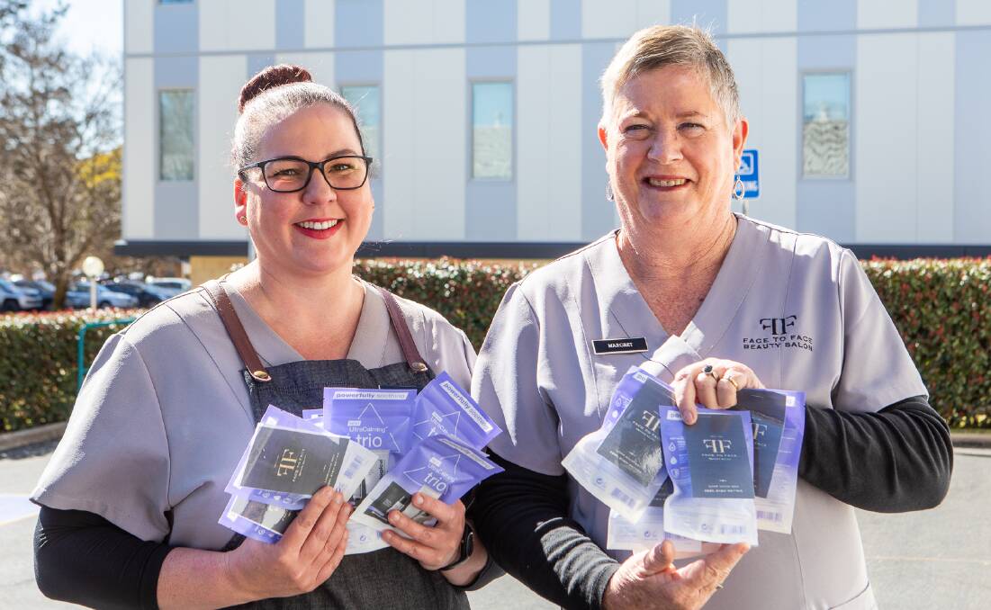Nicole Brown (left) and Margaret from Face2Face Beauty Beauty Salon delivering the Dermalogica facial packs to nursing staff at Armidale Hospital last week.Photo Simon Scott