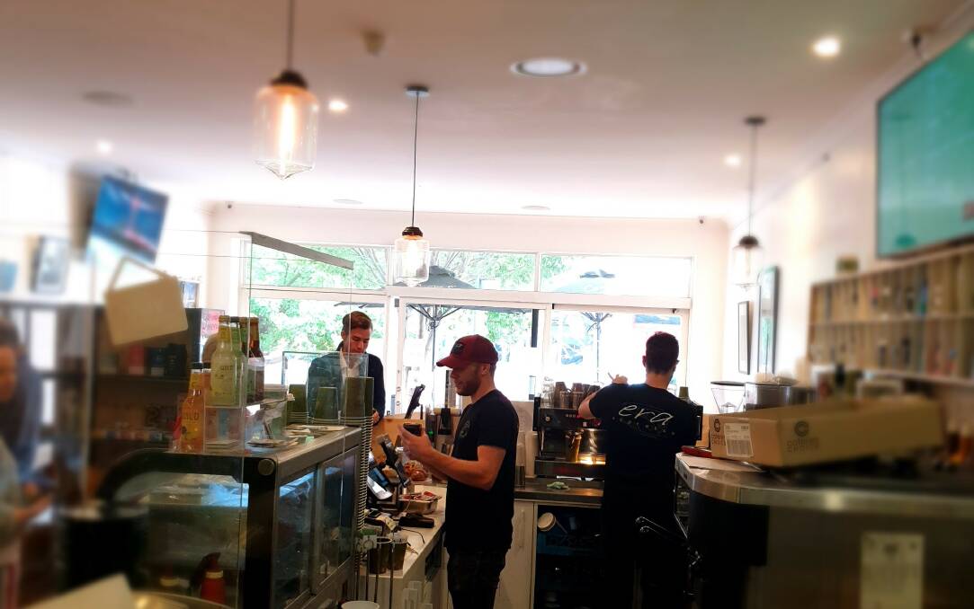 Kyle Donnan and Alex King behind the coffee machine at Era Espresso
