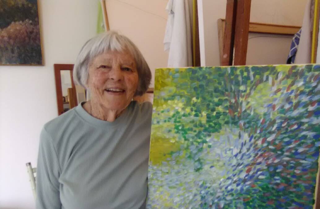 ART IS EVERYWHERE: Mrs Patricia Elkin OAM with one of her recent abstract works. Picture: supplied.