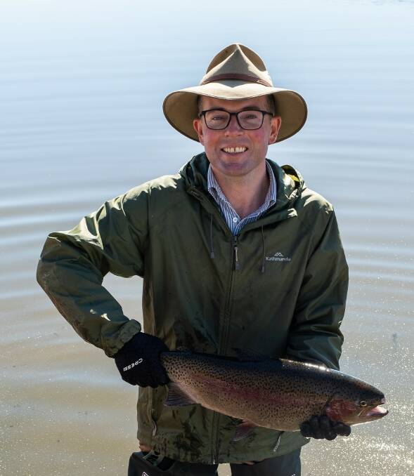 GONE FISHING: MP Adam Marshall with one of reasons why the banks of Dumaresq Dam should be 'packed all -year-round'. Photo:supplied.