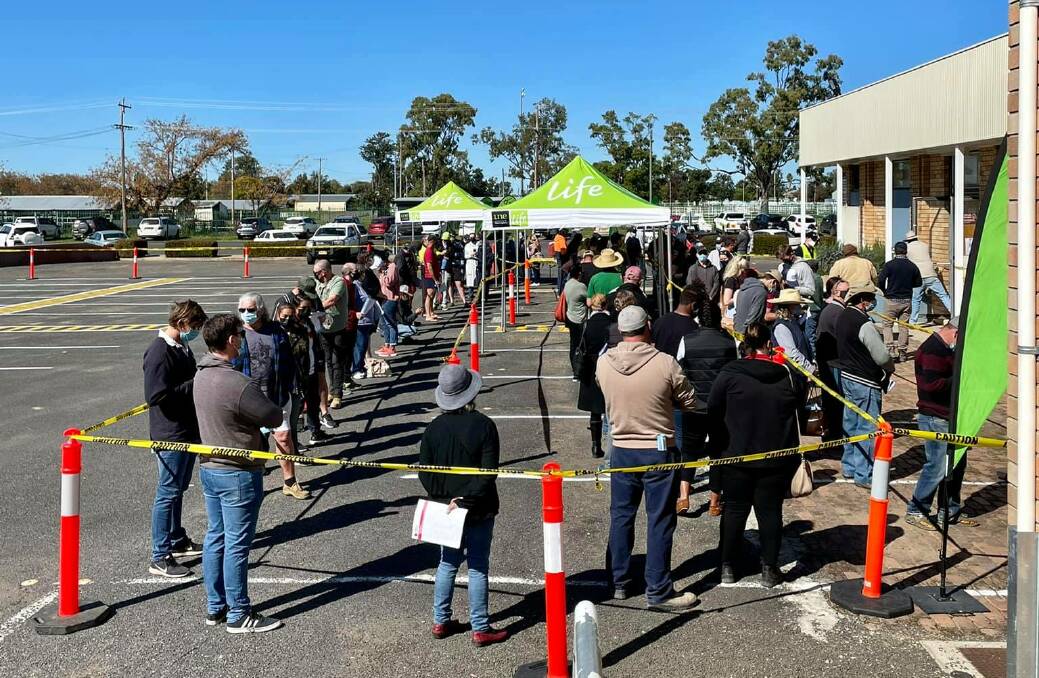 Lining up at the Super Vax clinic in Moree last Saturday. Photo: courtesy of UNELife and Adam Marshall MP.