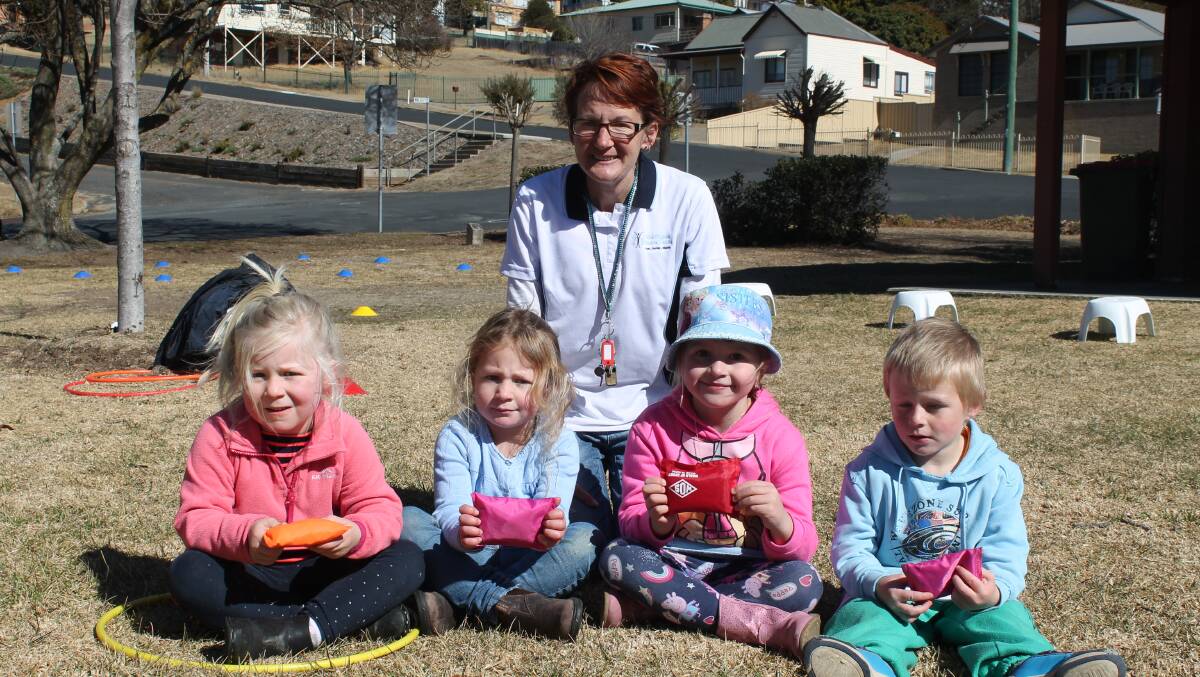 Amanda Barton and some Walcha members from her Tiny Tots athletics in McHattan Park earlier this month 