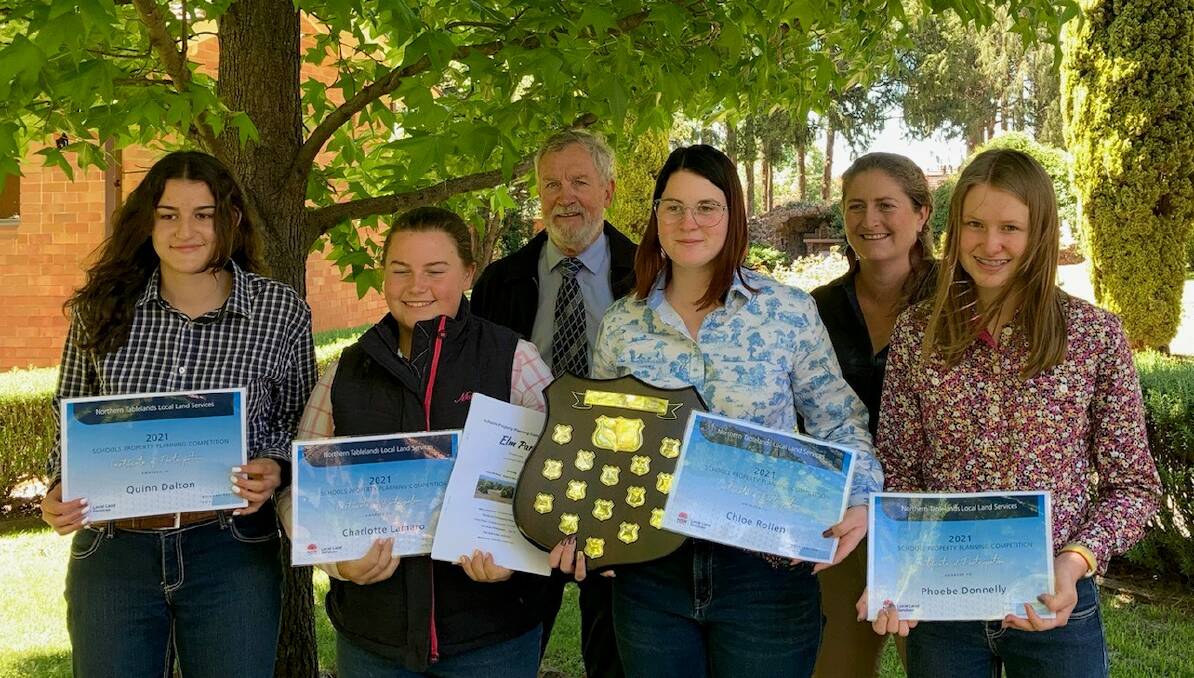 ALL SMILES: 2021 Schools Property Planning Competition winners from O'Connor Catholic College. Front row L-R: Quinn Dalton, Charlotte Lamaro, Chloe Rollen and Phoebe Donnelly. Back row: Northern Tablelands Local Land Services board chair, Grahame Marriott, and board member, Jane Mactie.Picture: supplied.