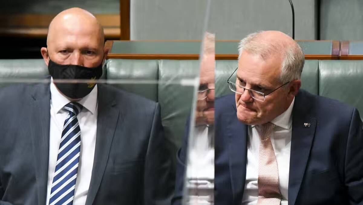 Morrison and Dutton have condemned what they describe as an aggressive, intimidating act. Lukas Coch/AAP
