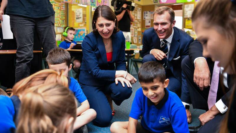 NSW Premier Gladys Berejiklian (centre), and Education Minister Rob Stokes (right) are seen at Seven Hills North Public School. Photo: AAP Image, Brendan Esposito
