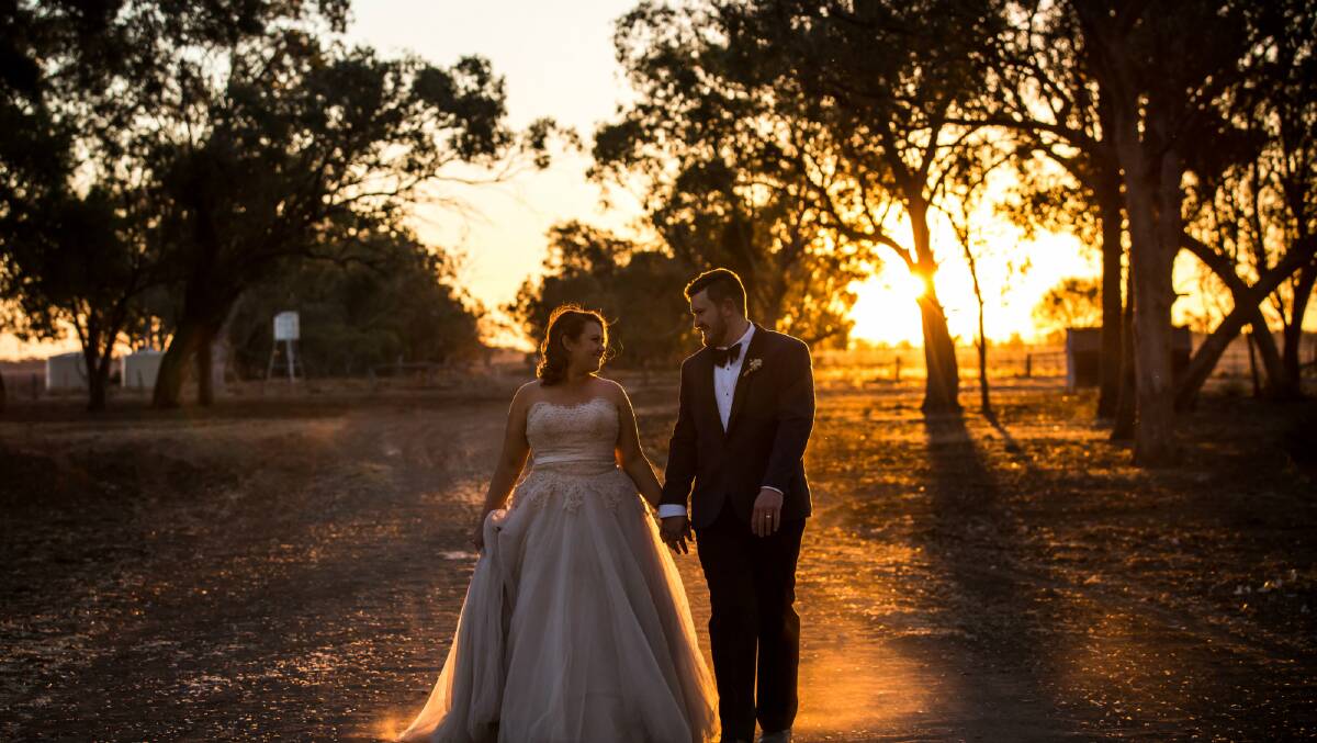This photo from a wedding at Garah in recent days shows the lack of green is no impediment to beautiful photos. Photo: Rebel Heart Photography