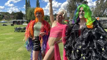 Drag queens Luci Dream, Daphne Gaye and Havanna Dream welcome visitors to Armidale's inaugural Pride in the Park on Friday, February 23. 