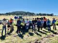 Some of the team at the tree planting at Kindly Sanctuary. Armidale Tree Group's open day, on April 7, will have trees, shrubs and groundcovers all for sale.