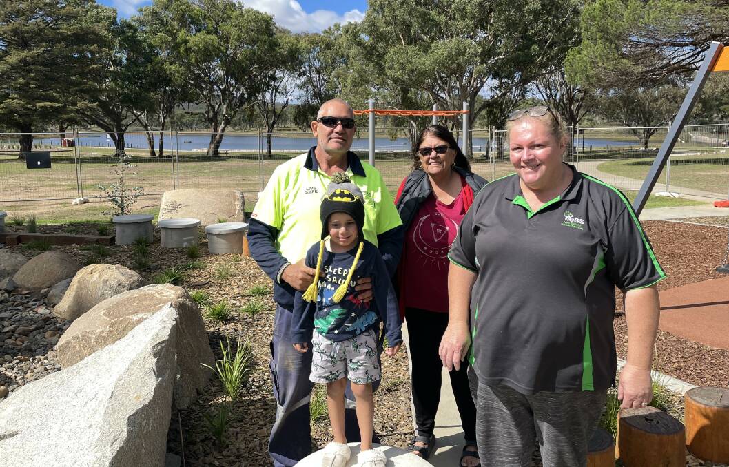 Shane Moore, Rennie Moore, Kelly Rowe and Elias Moore check out the playground and barbecue facilities at the revamped Dumaresq Dam before its official opening on Saturday, April 13.