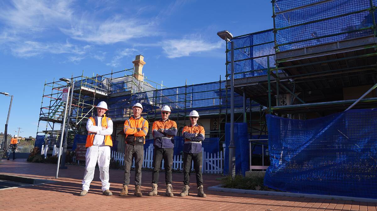 Local painting contractor Jeff Love, Bluewater site project manager Michael Pearce, Royce Davies and Jarad Atfield on site at the refurbishment of the Armidale Train Station.