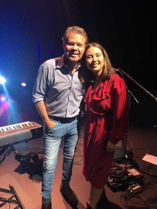 Troy Cassar-Daley with his daughter Jem who is opening his concert.
