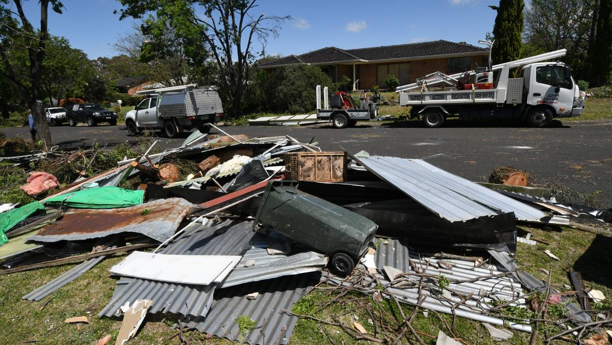 The clean-up is continuing following Thursday night's tornado which hit streets in North Armidale. Picture: Gareth Gardner