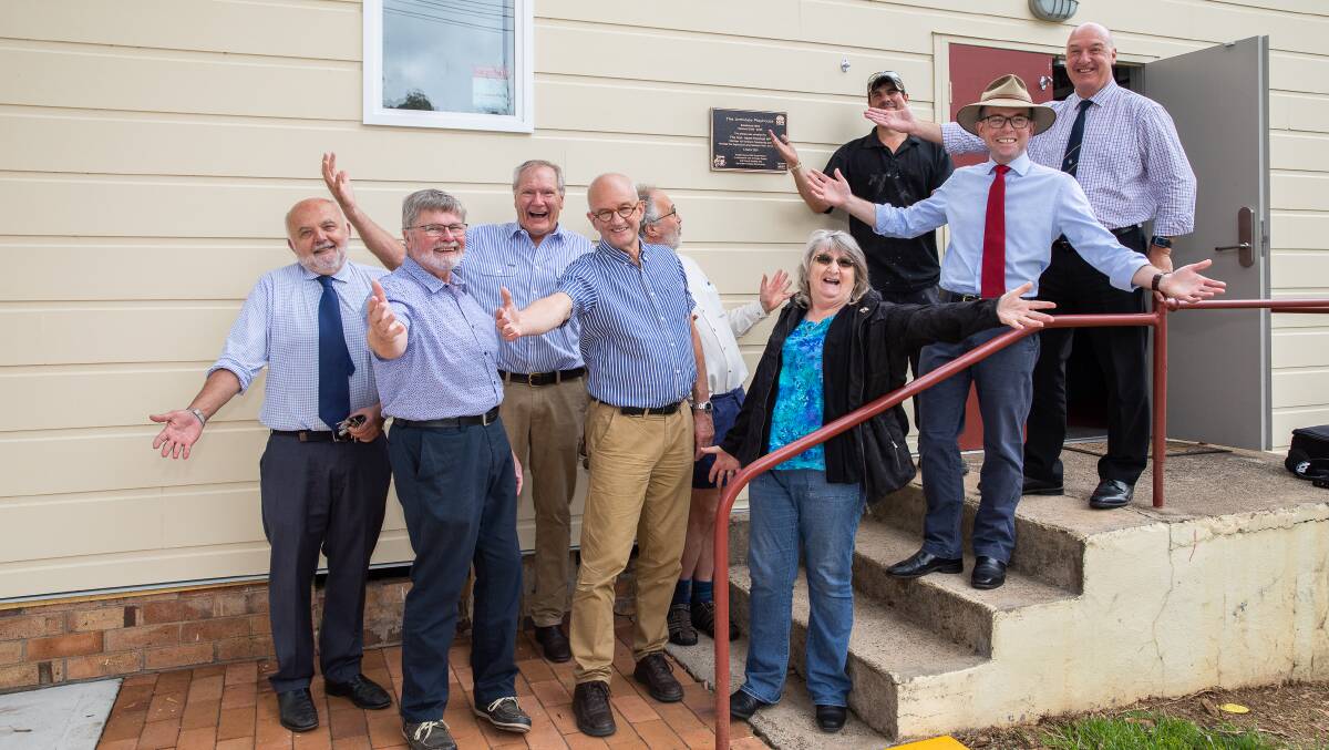 Officially opening the new-look and redeveloped Armidale Playhouse Theatre (from left) working group members Pat Bradley, Stuart Pavel, Greg Quast, Dr Bruce Menzies, Dr Benjamin Thorne, Marnie Tilley, Northern Tablelands MP Adam Marshall, builder James Paliadelis, and Armidale Dramatic and Musical Society President Neil Horton.