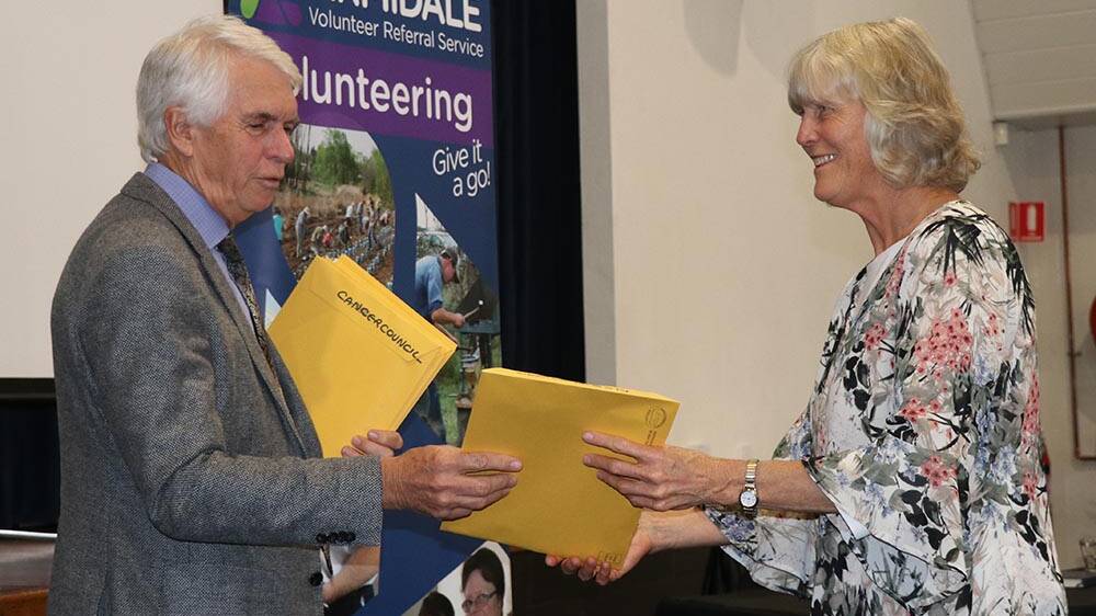Armidale Regional Council Acting General Manager John Rayner presented certificates to volunteers.