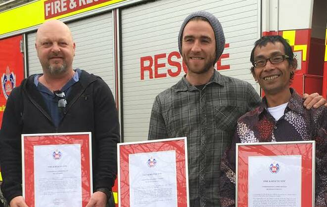 COURAGE: Ivan Smith, Nicholas Daniell and Hidayat Hidayat previously received awards from NSW Fire & Rescue for their efforts. Picture: Laurie Bullock