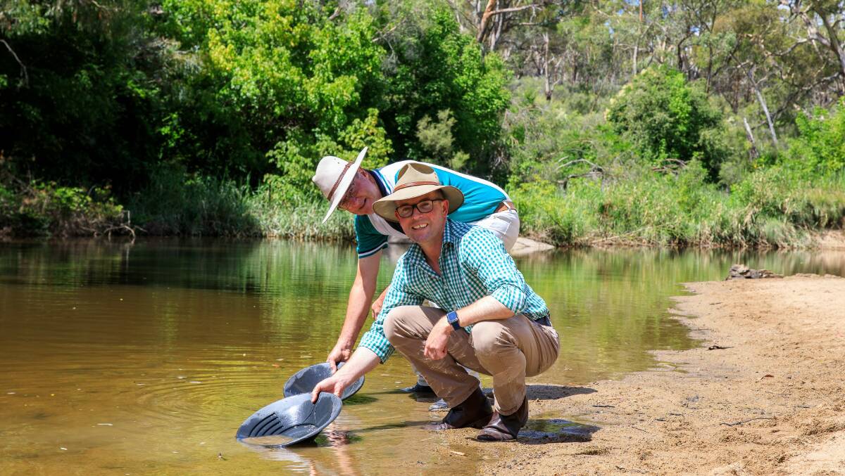 Panning for gold: Northern Tablelands MP Adam Marshall, front, and Uralla Shire Council deputy mayor Bob Crouch seek their fortune at Wooldridge Reserve. Picture: Supplied