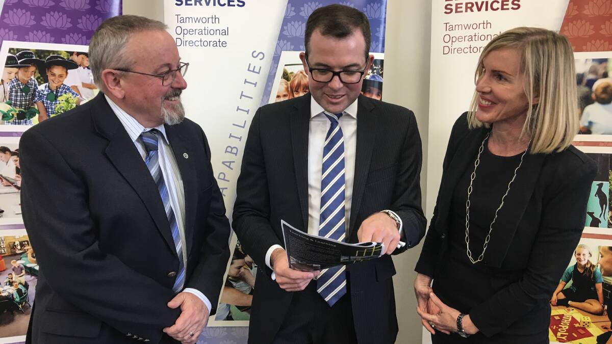 Northern Tablelands MP Adam Marshall and Armidale High School Principal Carolyn Lasker, right, and Duval High School Principal Stafford Cameron, at the announcement that a new school would replace the two high schools, in June last year.