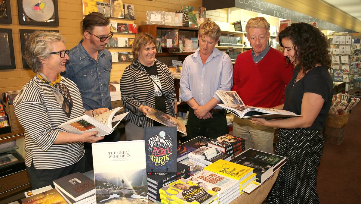Reader's Companion owner Michelle Wheatley, Live & Local program coordinator Liam Kelleher, Caroline Downer from Arts North West, John Wardle from Live Music Office, Project Manager from Armidale Regional Council Tony Broomfield and Lucy Joseph from Live Music Office inside the Reader’s Companion bookstore that will host live performances during the festival.