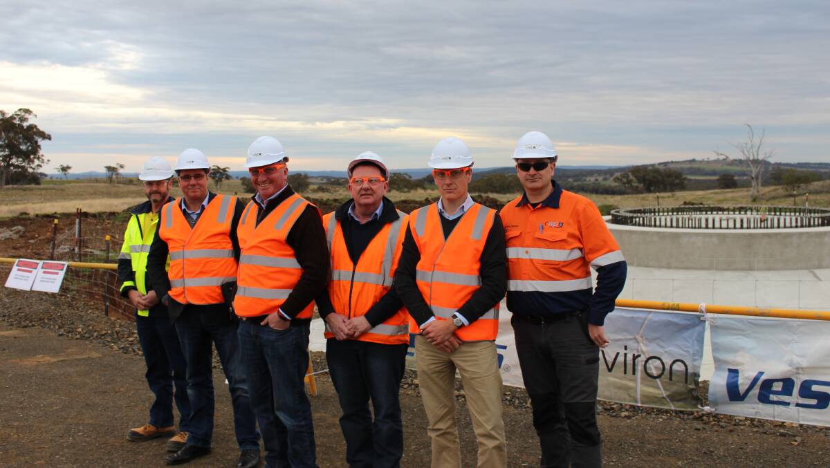 Barnaby Joyce (third from left) inspects Sapphire Wind Farm.