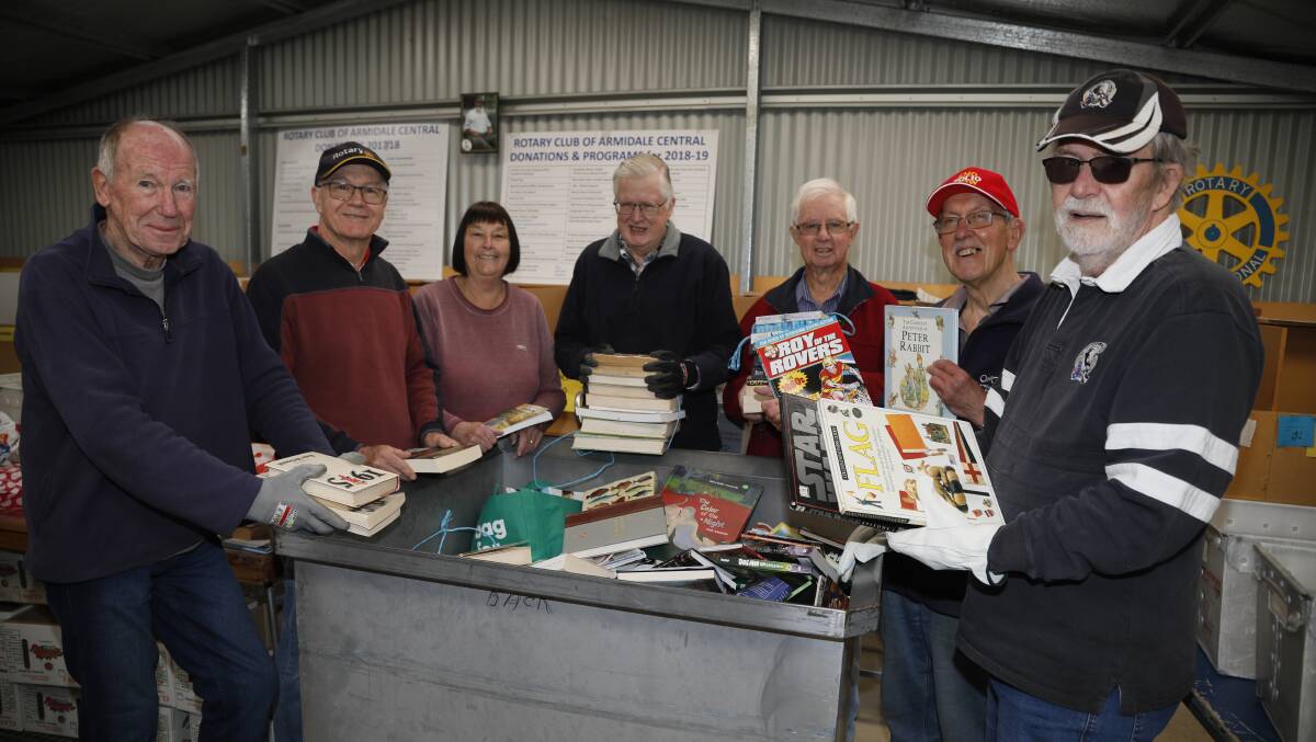 Rotarians were back on the job in their book shed after the successful fair. Picture supplied